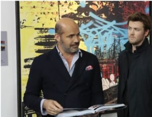 Billy Zane Romantic Curls to a Polished Bald Look