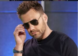 Joel McHale was okay with his hair plugs